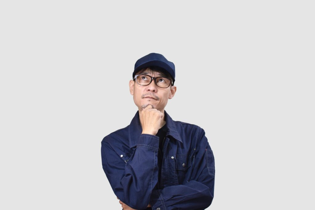 考える人
